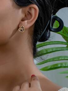 Boucles d’Oreilles Cœur Imprimé Léopard – Élégance et Tendance